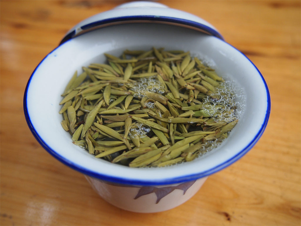 A teacup (gaiwan) with green tea